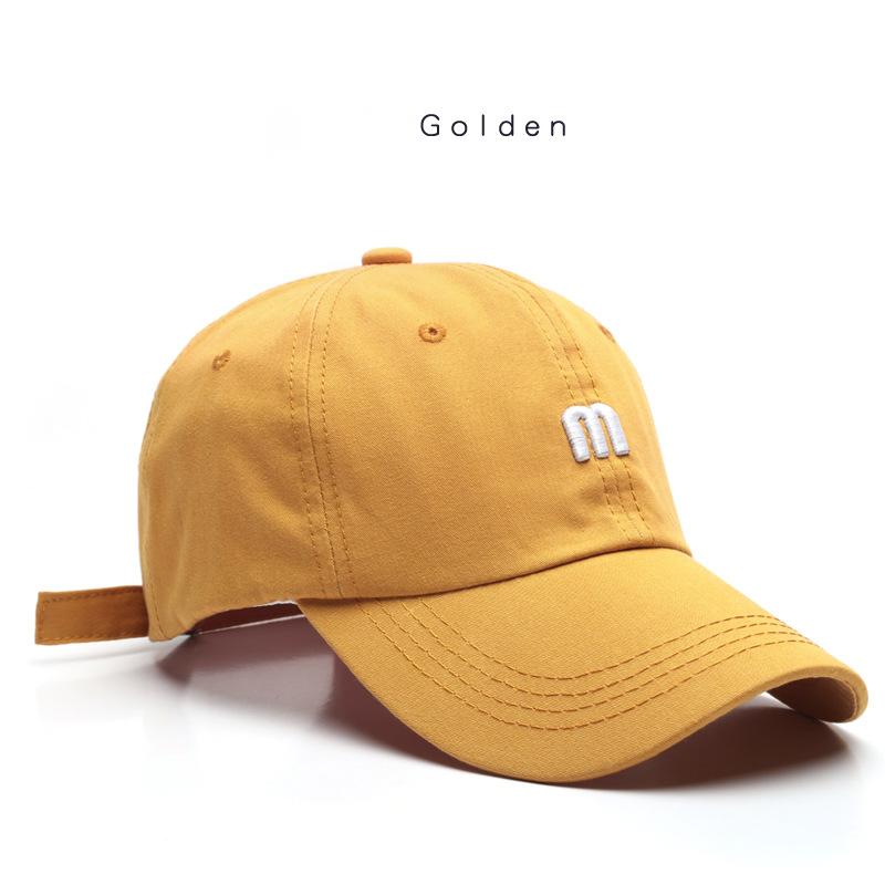 A Cap Featuring an Embroidered M, Designed As a Soft Sunshade Hat,