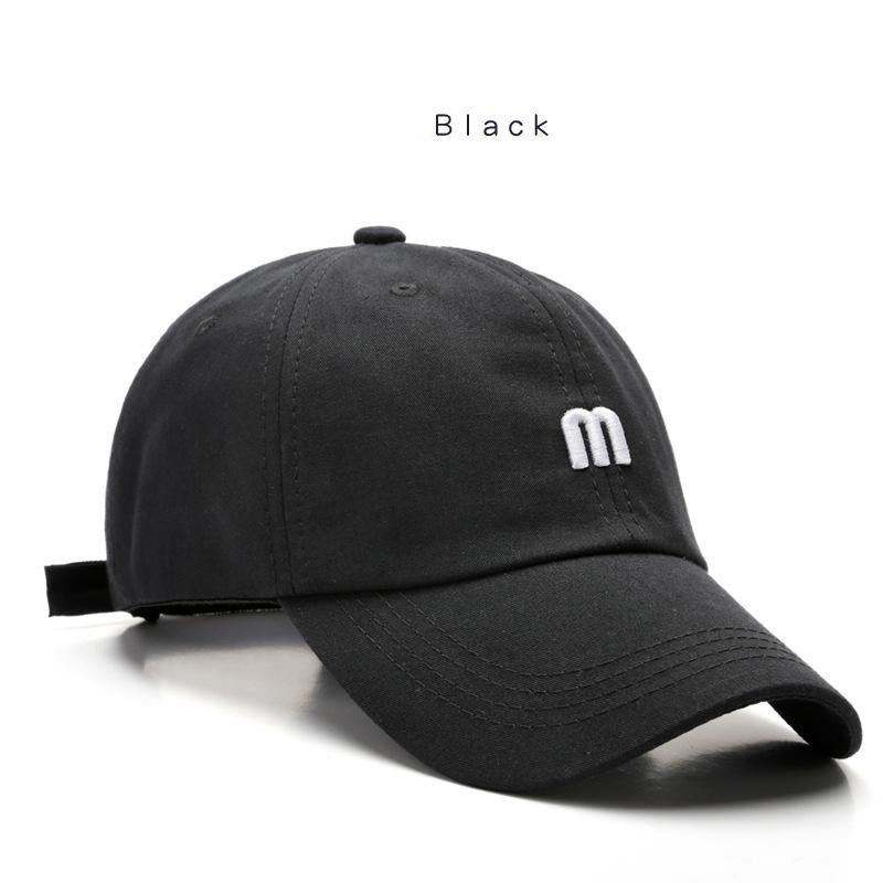 A Cap Featuring an Embroidered M, Designed As a Soft Sunshade Hat,