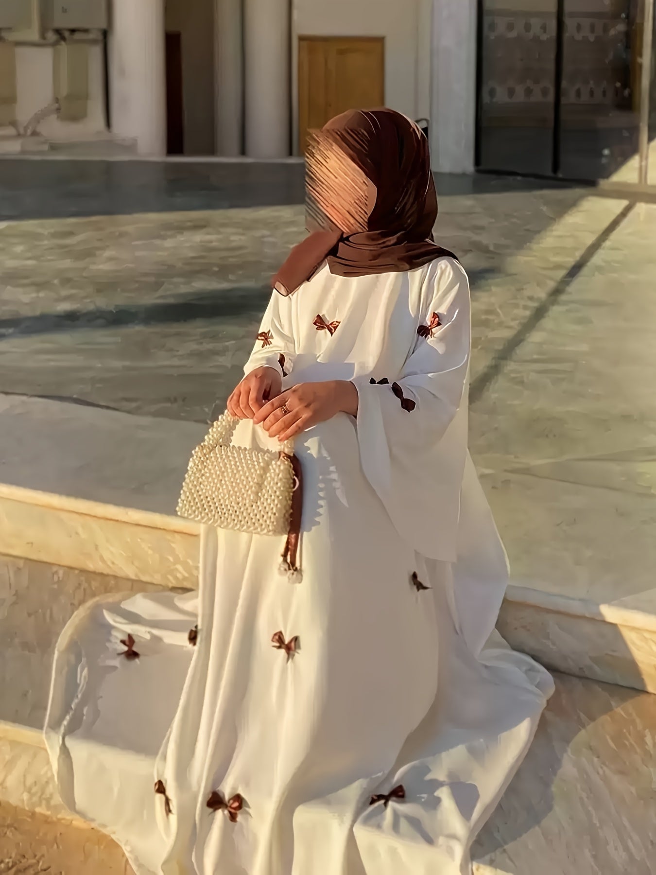 Elegant White Abaya with Blue Bow Accents - ./MH