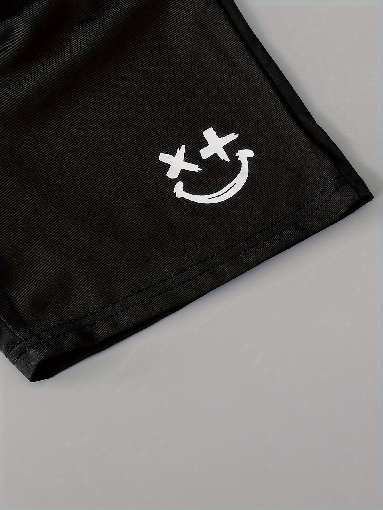 3pcs Boys Casual Solid Short Sleeve T-shirt & Smile Face Print Shorts.