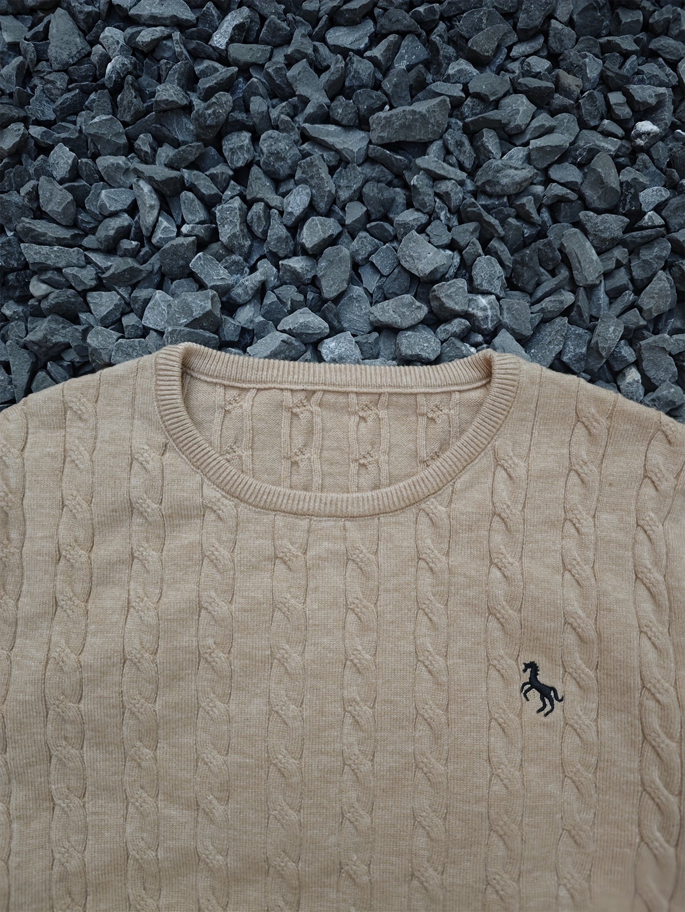 A Knitted Sweater for Teenage Featuring a Twisted Pattern .