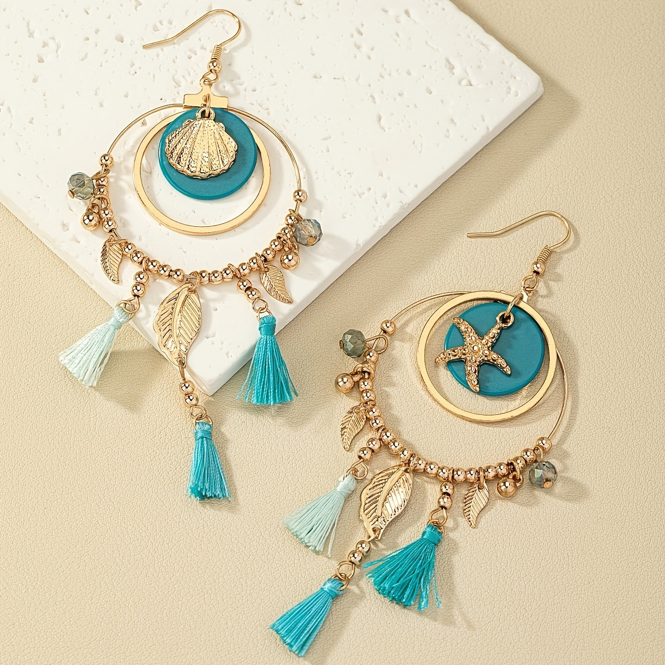 Dainty Bohemian Leaf Tassel Pendant Earrings - Delicate Hollow Circle Design, Starfish Shell Accents, Dangle Style, Vocation-Inspired, Perfect Female Gift for Boho Chic Lovers