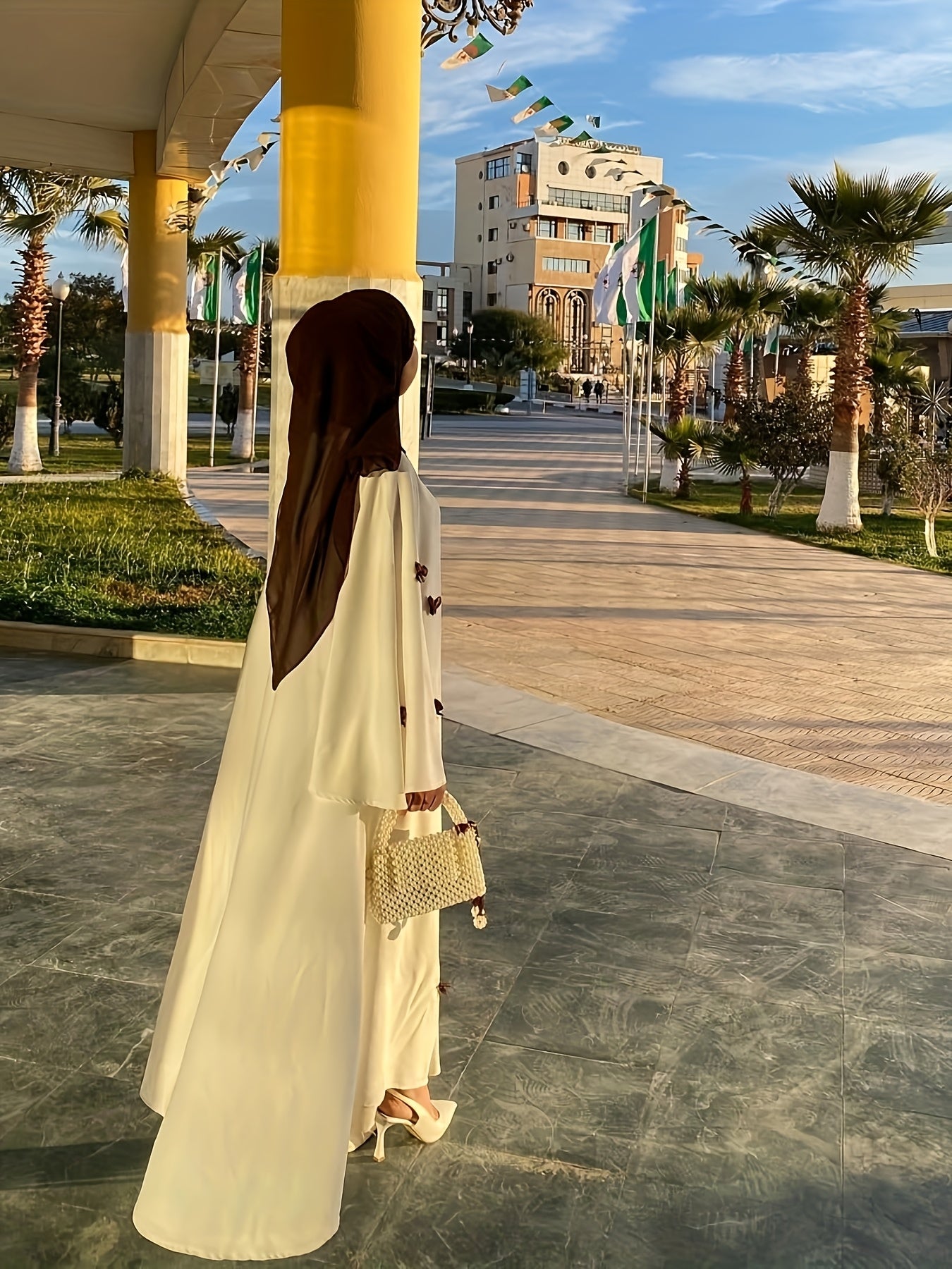 Elegant White Abaya with Blue Bow Accents - ./MH