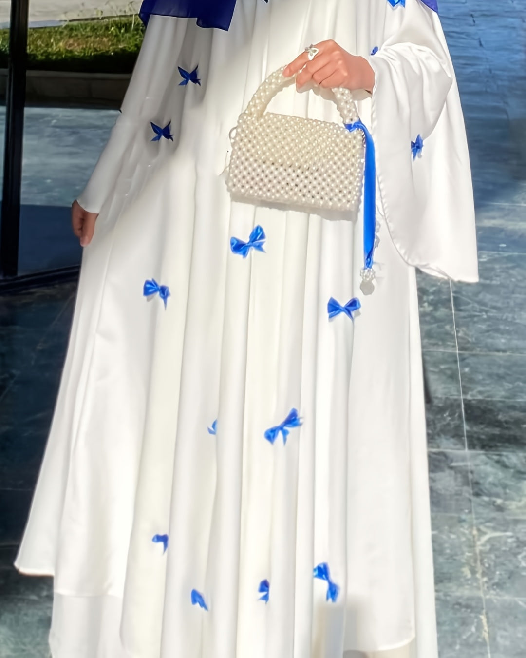 Elegant White Abaya with Blue Bow Accents - ./MH