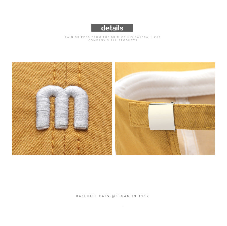 A Cap Featuring an Embroidered M, Designed As a Soft Sunshade Hat,