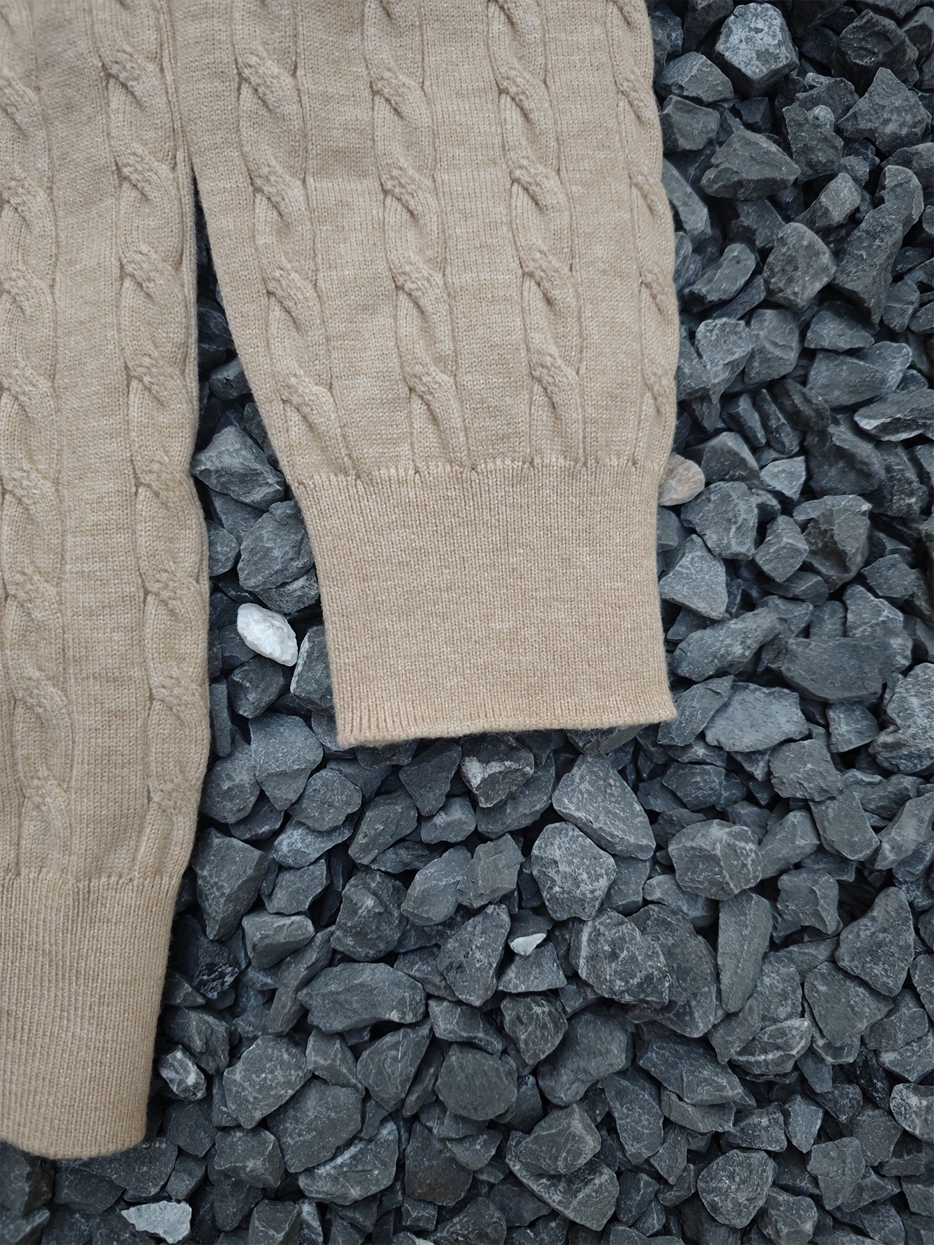 A Knitted Sweater for Teenage Featuring a Twisted Pattern .