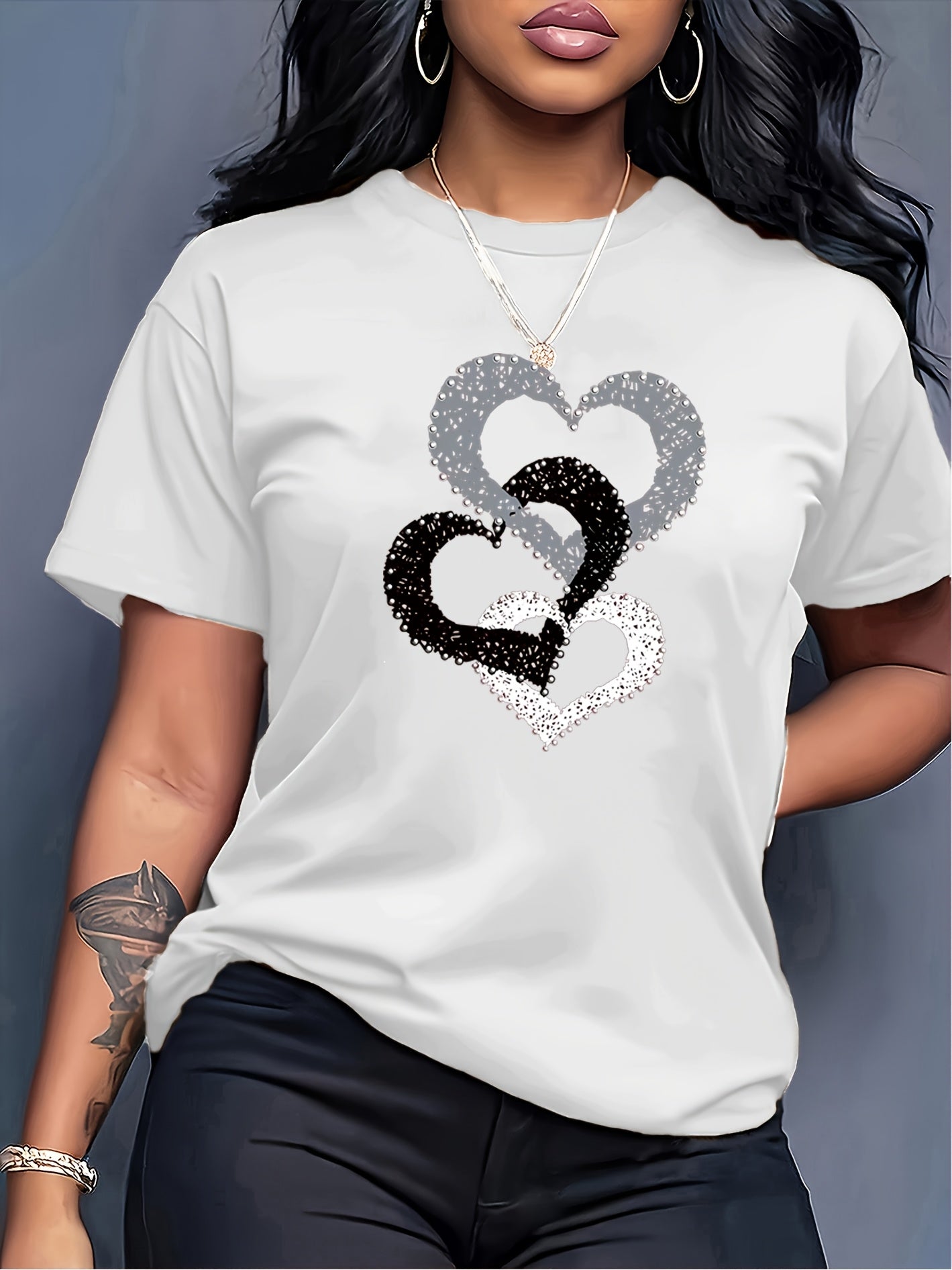 Women's Casual Short Sleeve T-Shirt with Overlapping Heart Print.