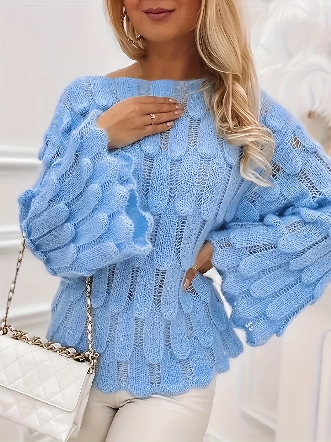 Solid Hue Cut-Out Knitted Pullover - Chic Flared Sleeve Sweater for Women - Fashionable Winter Wear with Eye-Catching Detail