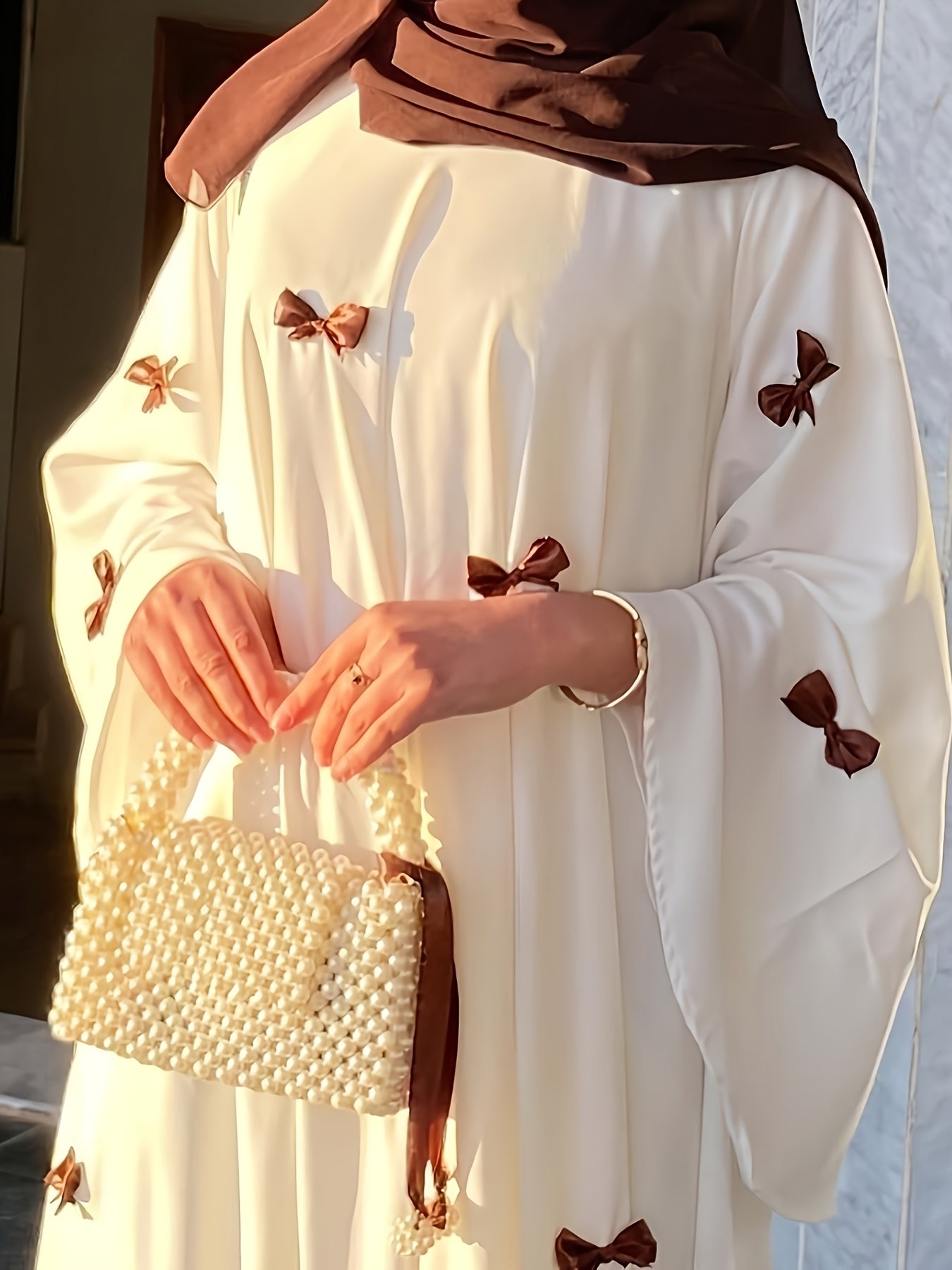 Elegant White Abaya with Blue Bow Accents - ./MH