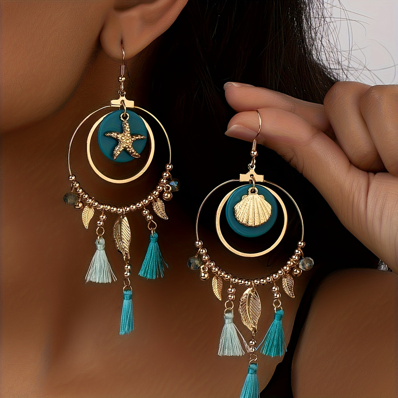 Dainty Bohemian Leaf Tassel Pendant Earrings - Delicate Hollow Circle Design, Starfish Shell Accents, Dangle Style, Vocation-Inspired, Perfect Female Gift for Boho Chic Lovers