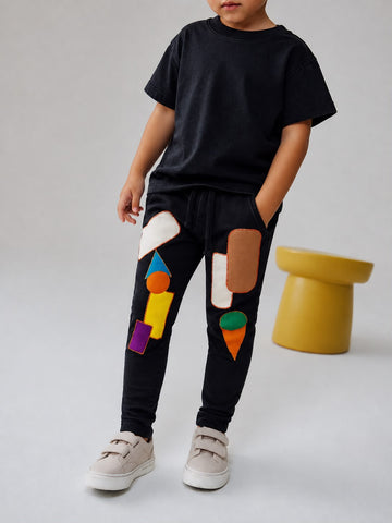 Boys’ Blue Denim Joggers with Colorful Geometric Patchwork Design, Sizes (1-12Years) | MH