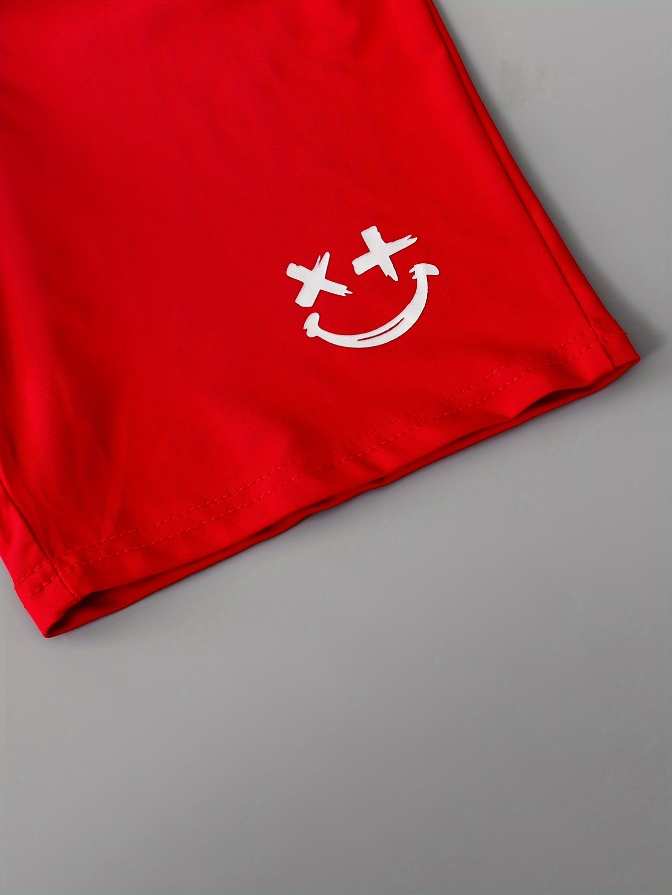 3pcs Boys Casual Solid Short Sleeve T-shirt & Smile Face Print Shorts.