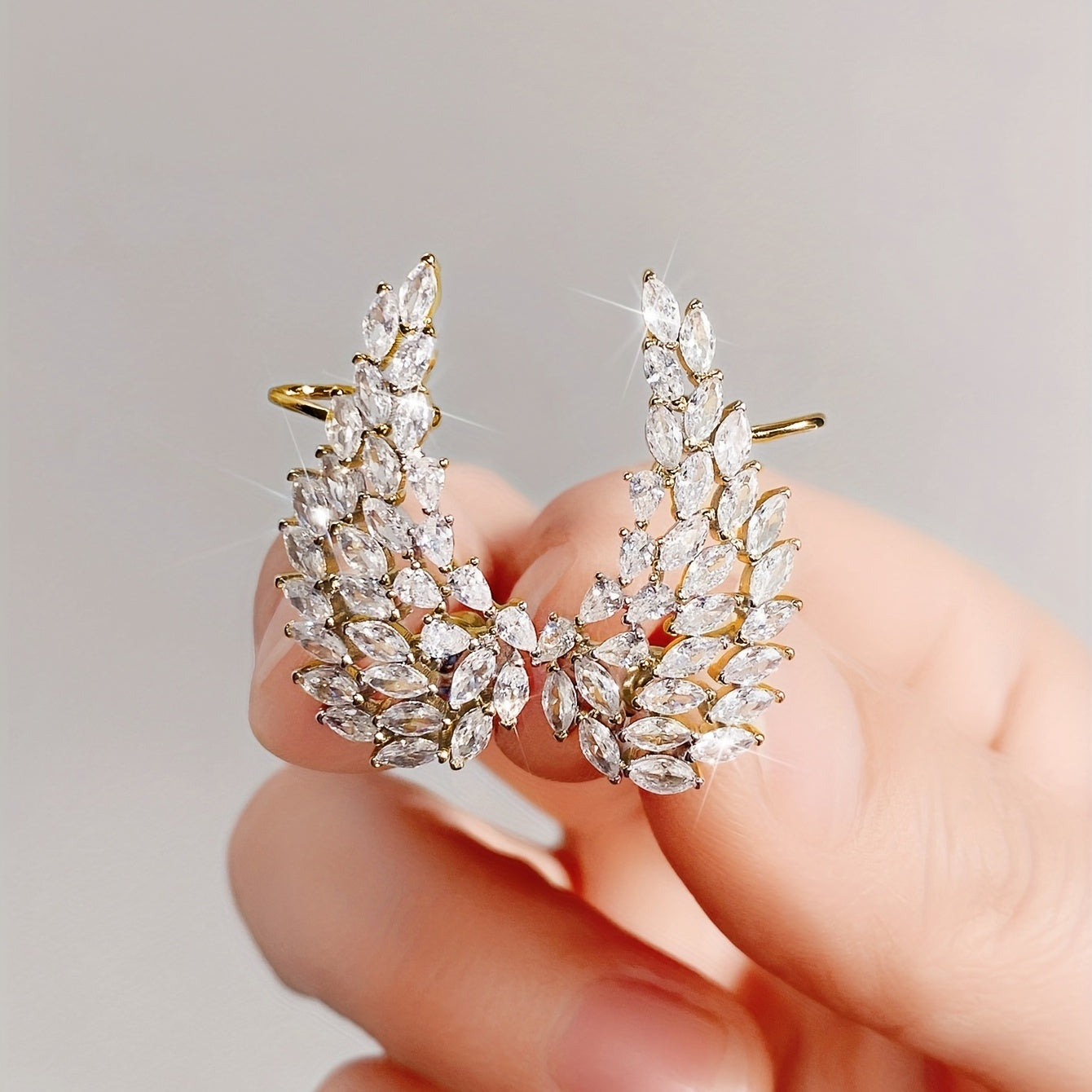 Golden Leaf Shaped Ear Clips - Exquisite Inlaid Zirconia, Delicate Fashion Accessory for Daily Wear, Ideal Gift for Ladies, Elegant and Simple Style
