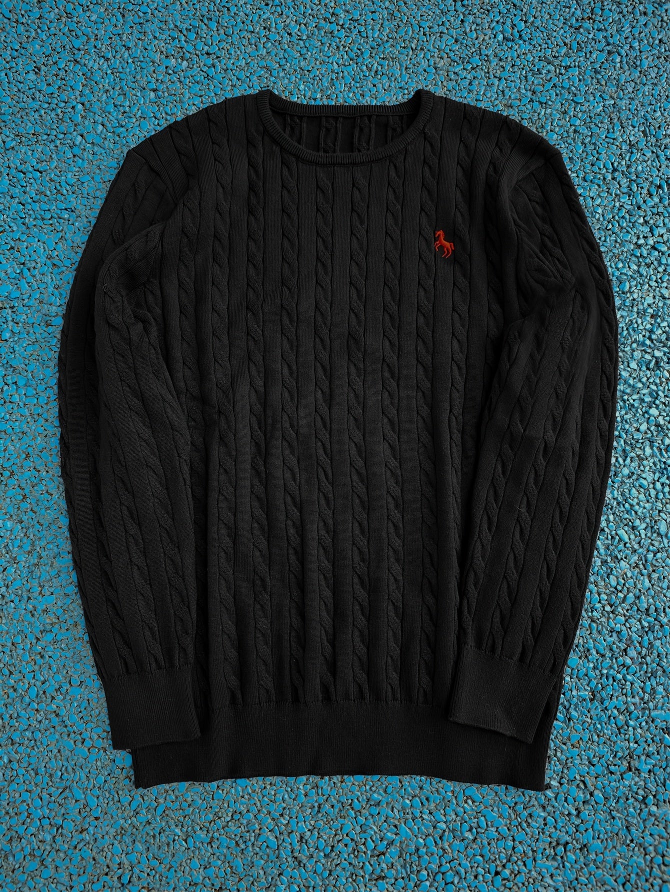 A Knitted Sweater for Teenage Featuring a Twisted Pattern .