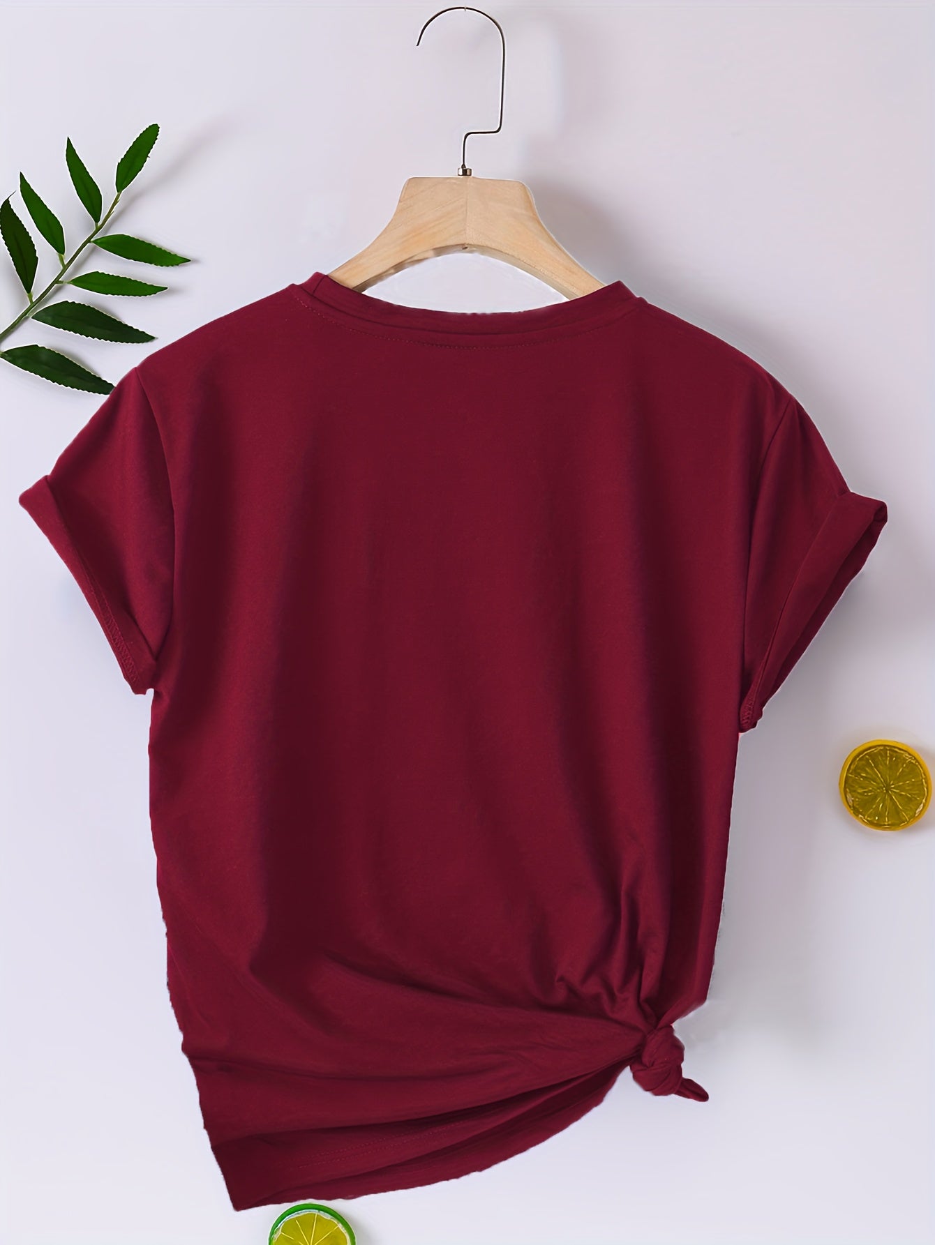 Women's Casual Short Sleeve T-Shirt with Overlapping Heart Print.