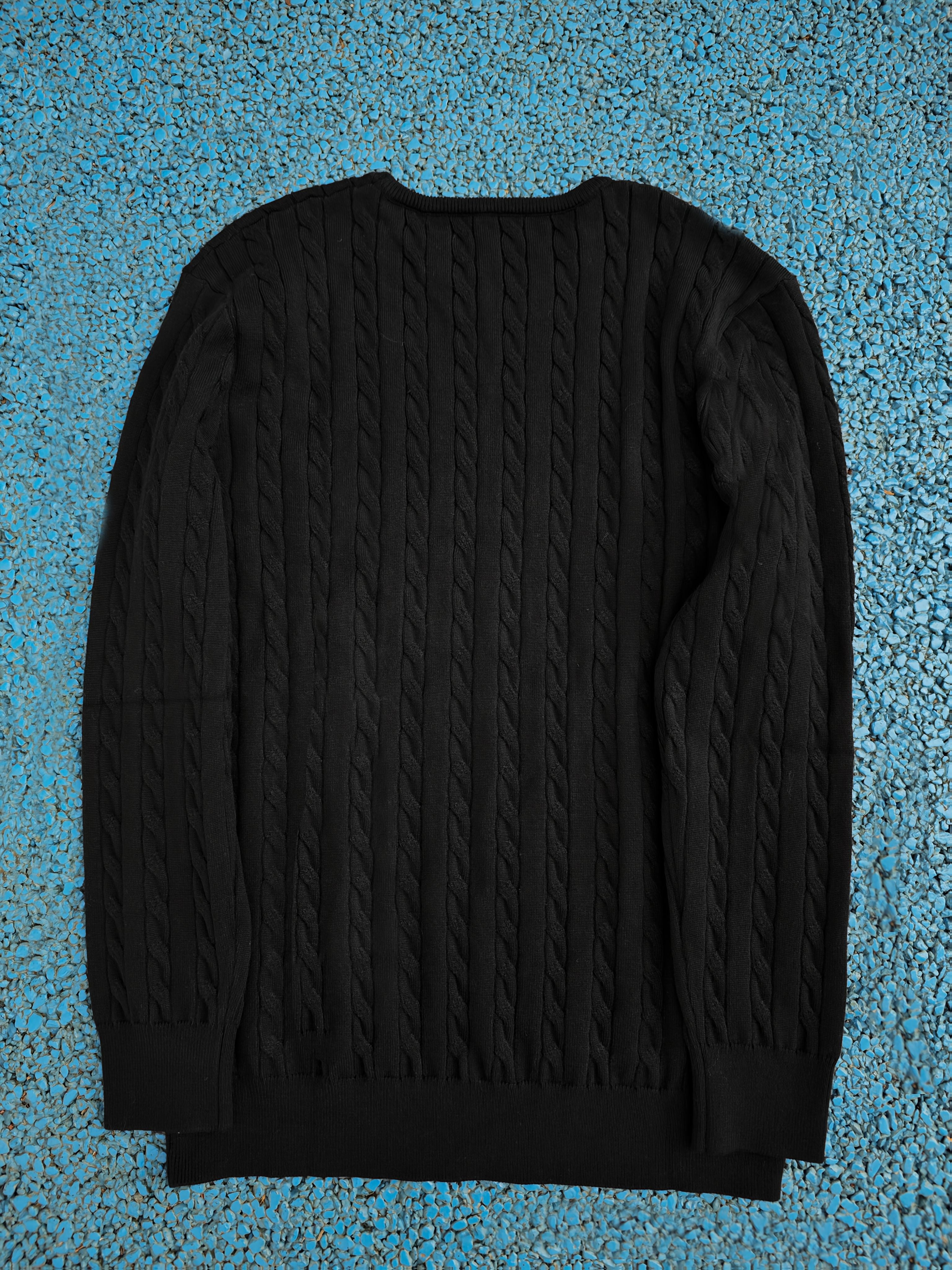 A Knitted Sweater for Teenage Featuring a Twisted Pattern .