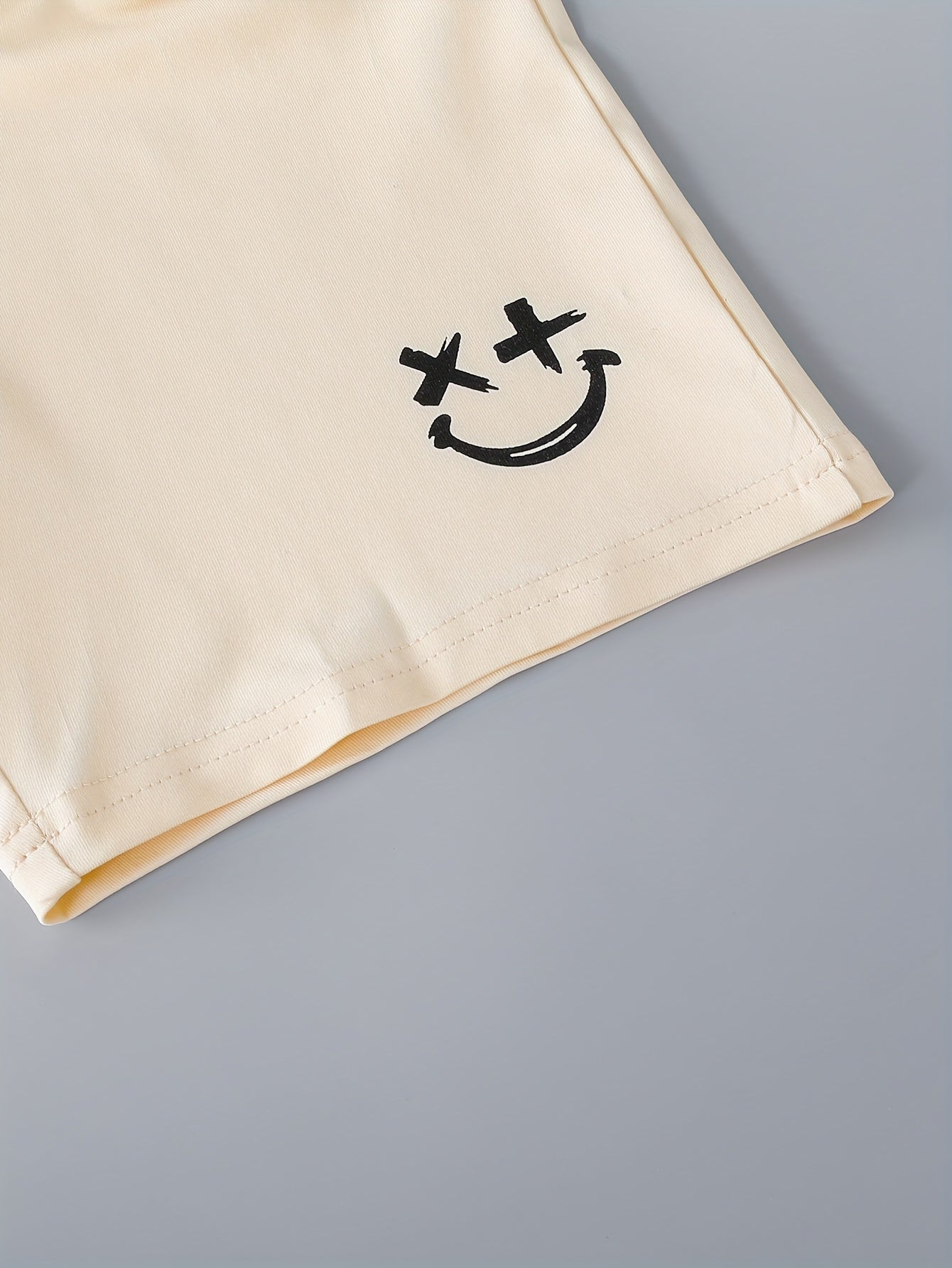 3pcs Boys Casual Solid Short Sleeve T-shirt & Smile Face Print Shorts.