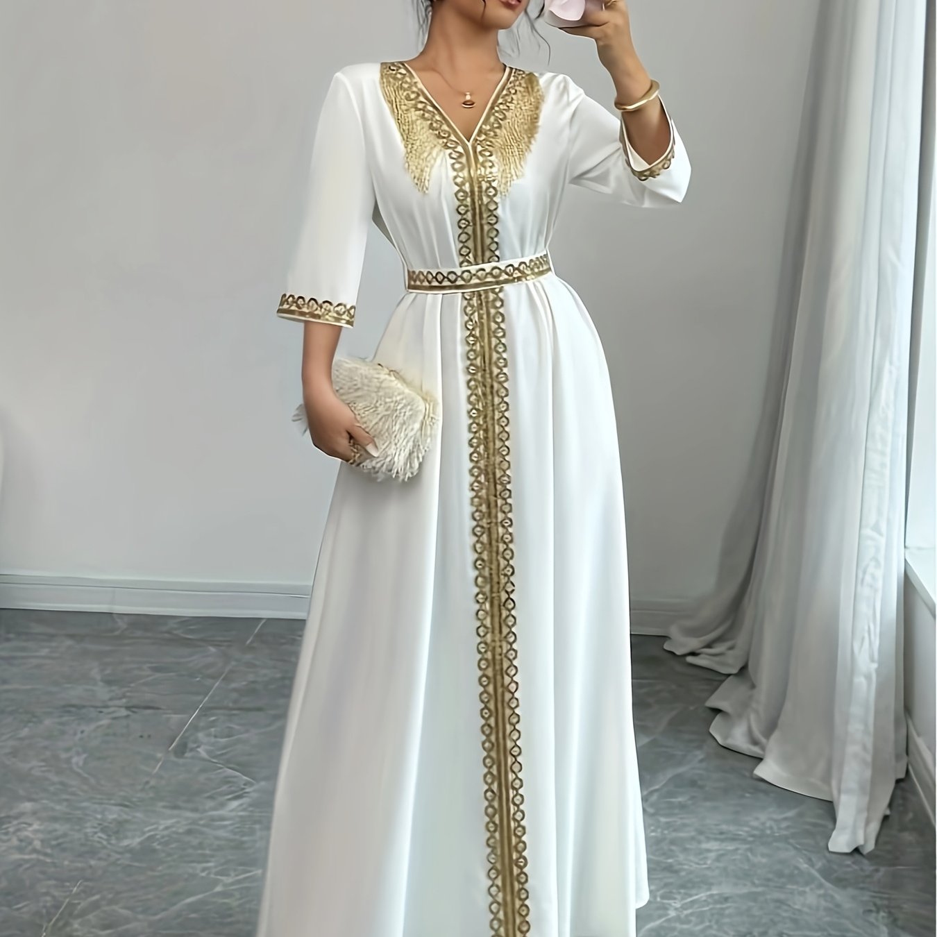 Elegant White V-Neck Maxi Dress with Golden Accents./MH