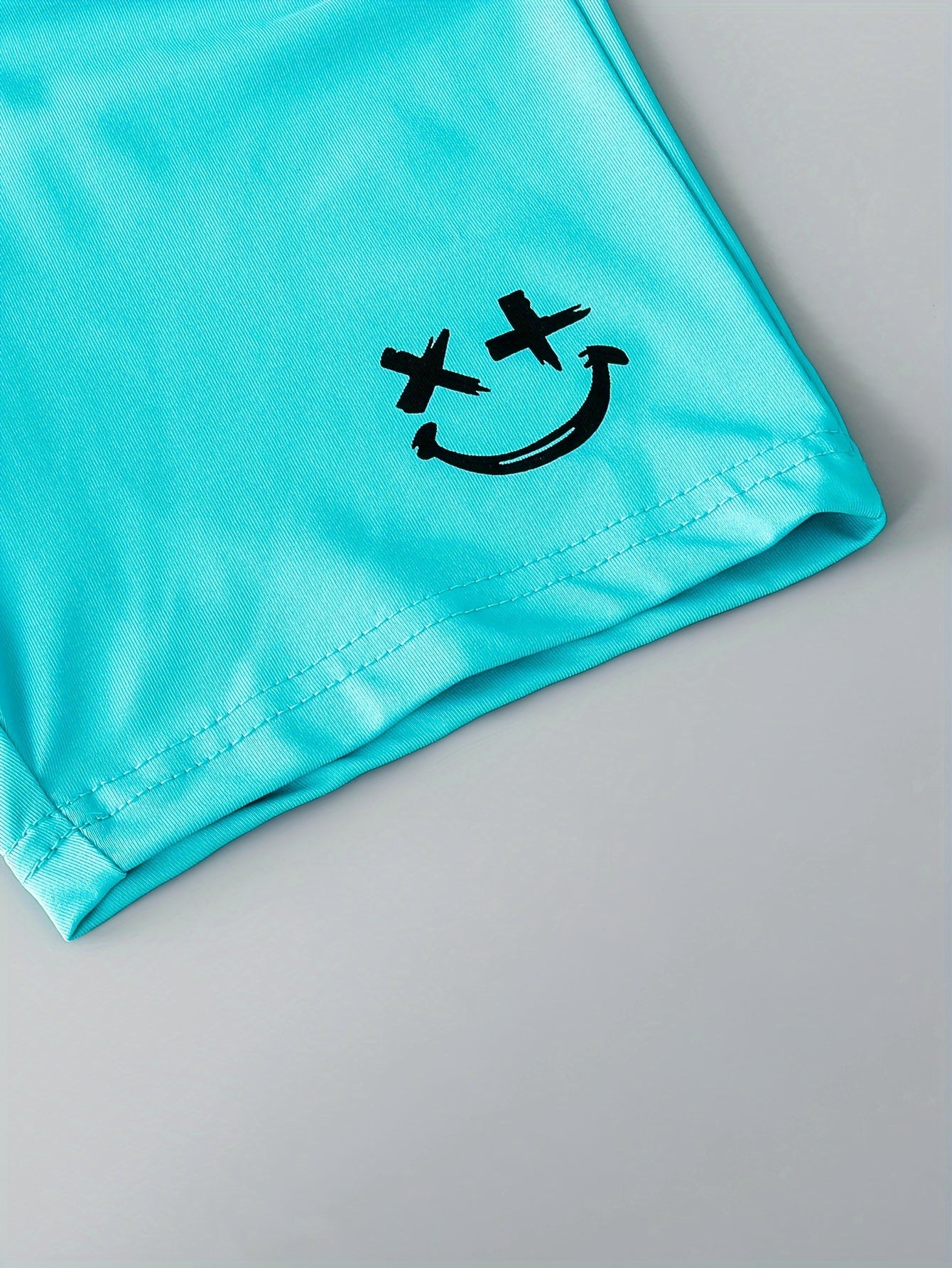 3pcs Boys Casual Solid Short Sleeve T-shirt & Smile Face Print Shorts.